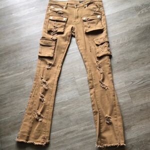 Tan cargo jeans with distressed front and back pockets